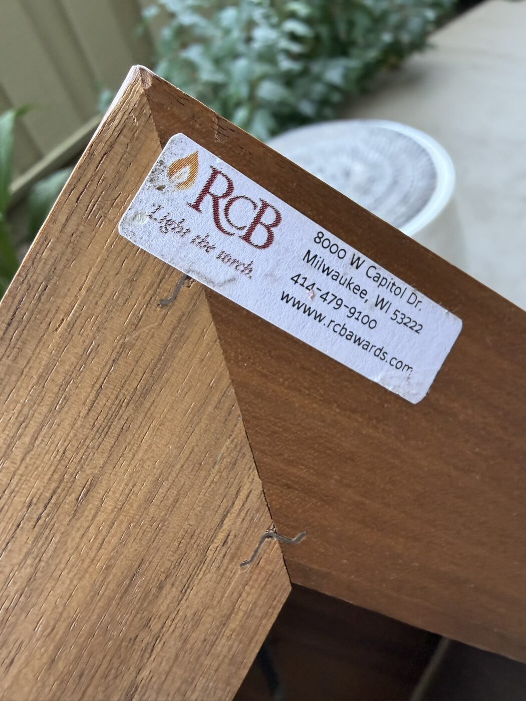 The original RCB Awards sticker on the underside of the base